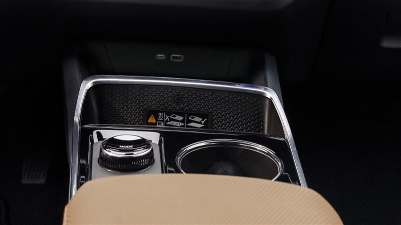 Wireless smartphone charging port inside the 2025 Chevrolet Equinox compact SUV.