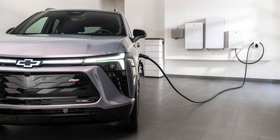  Chevrolet Blazer EV outside a modern building.
