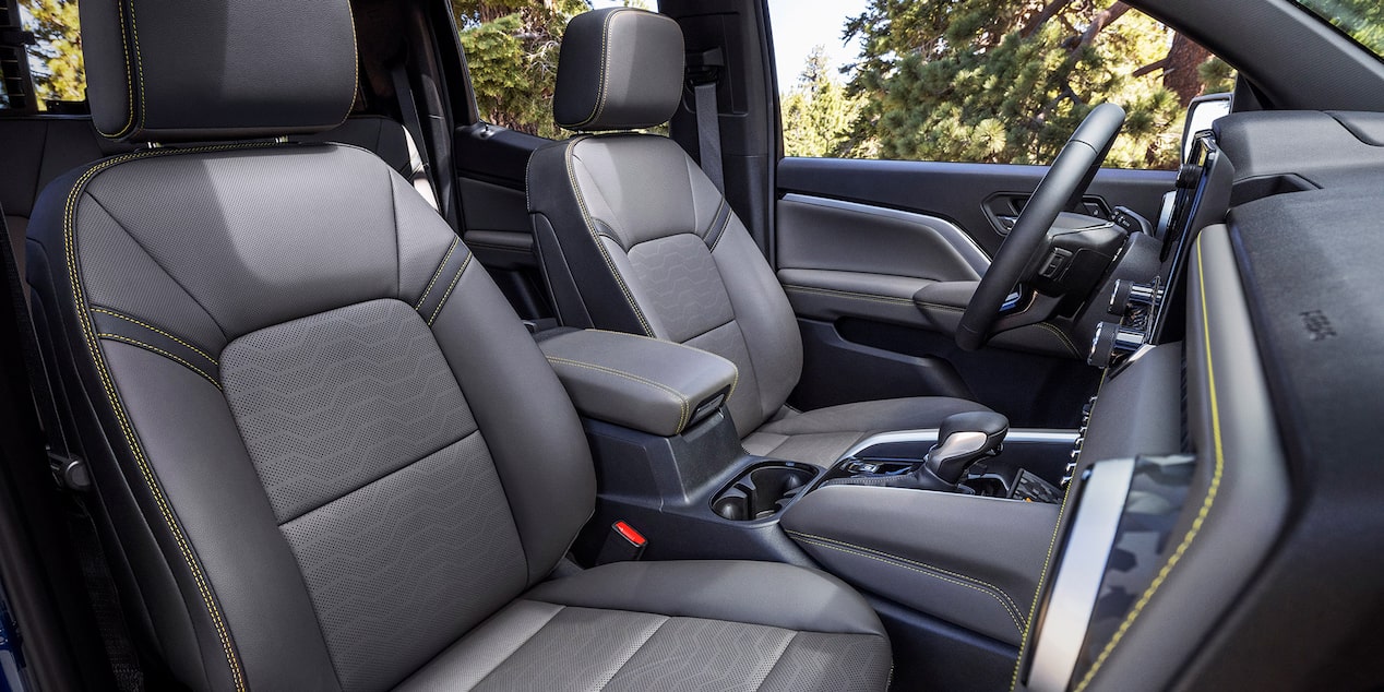 Side view of the spacious front interiors of the 2025 Chevrolet Colorado.