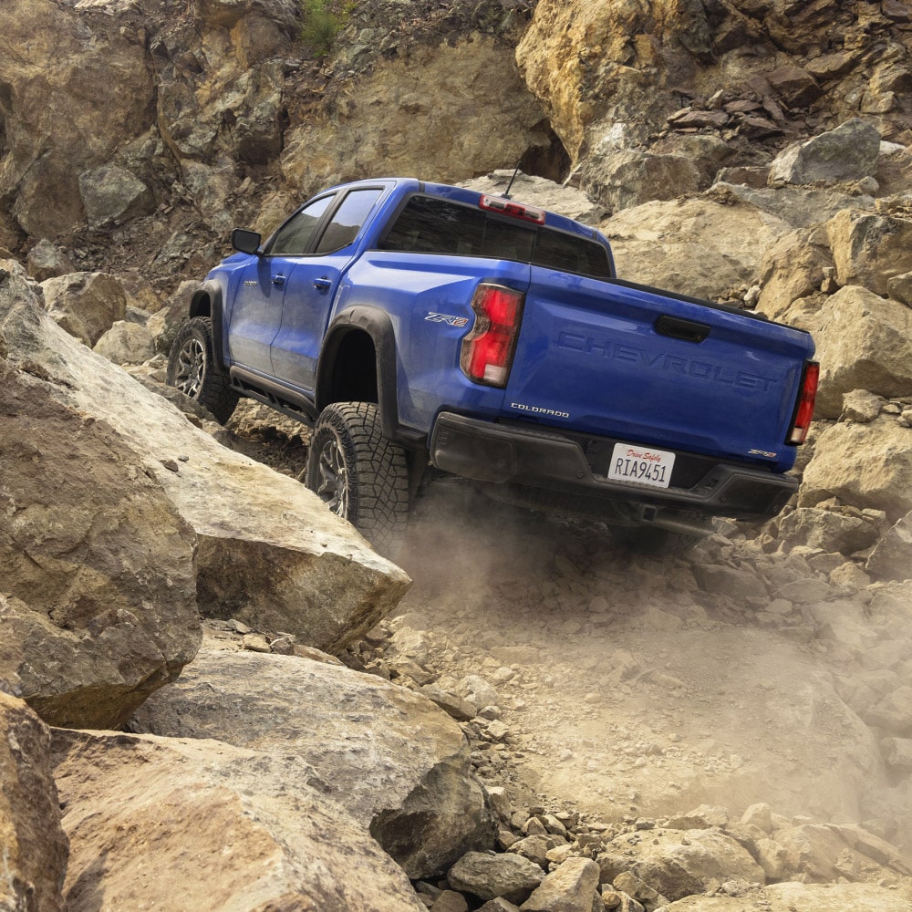 Overhead view of a 2025 Chevrolet Colorado driving up a rocky terrain.