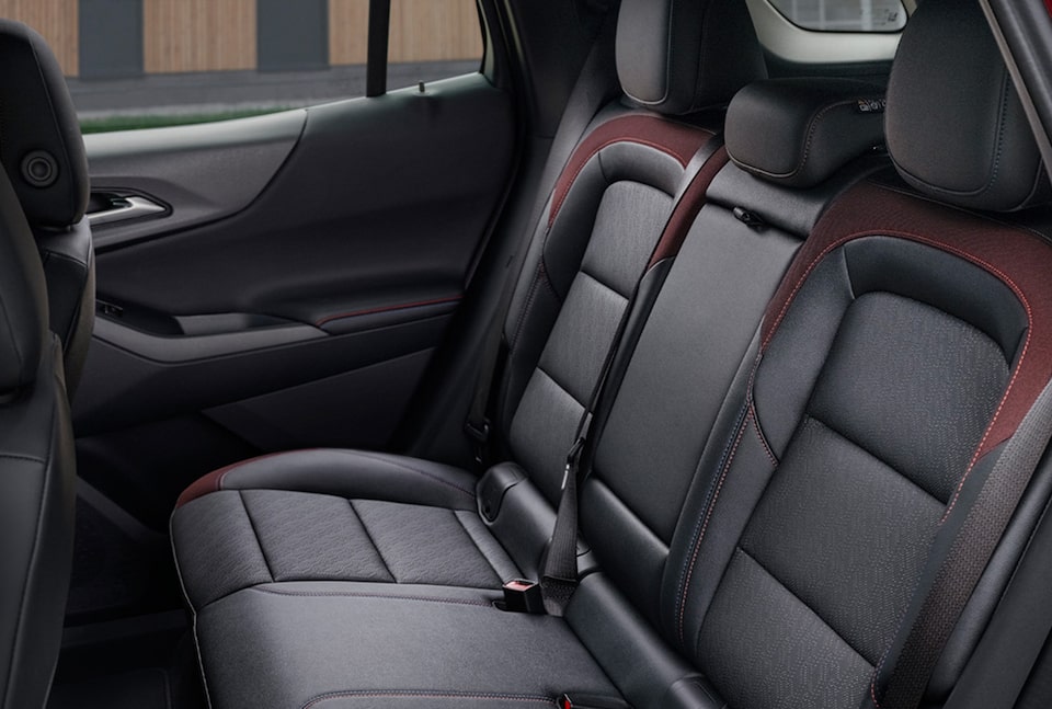 Rear second row seating inside the 2025 Equinox compact SUV.