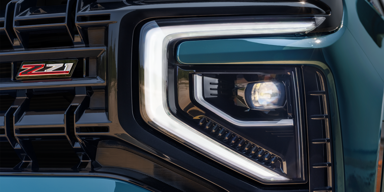 Close-up view of the headlight on the 2025 Chevrolet Tahoe SUV.