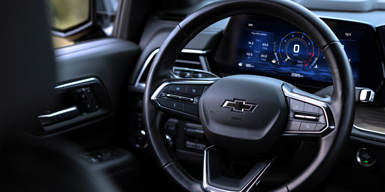 Close-up view of a steering wheel in the 2025 Chevrolet Tahoe SUV.
