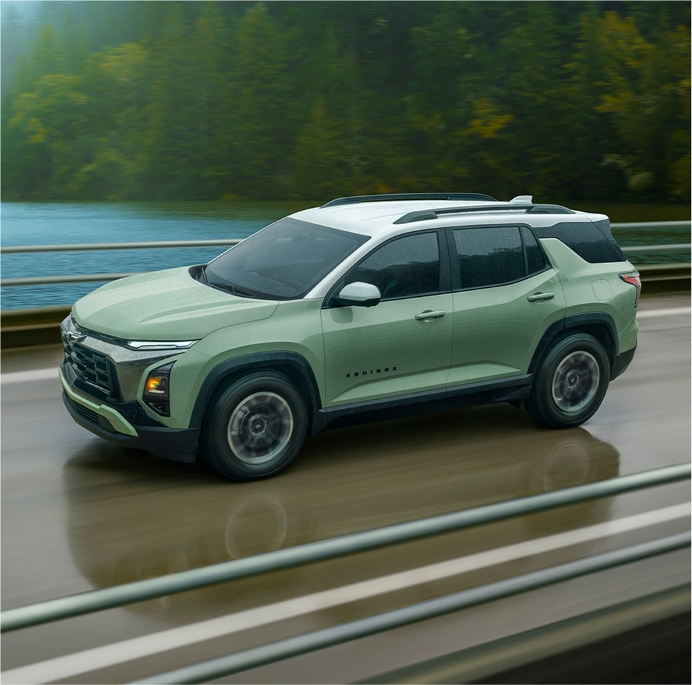 A 2026 Equinox driving alone on the bridge.