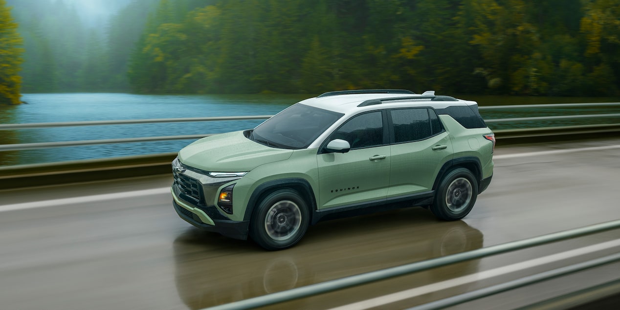 A 2026 Chevrolet Equinox driving alone on the bridge.