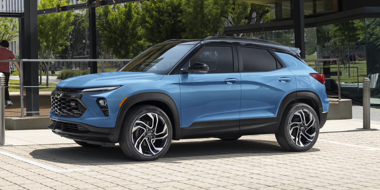 A 2026 Chevrolet Trailblazer RS trim parked outside a glass building.