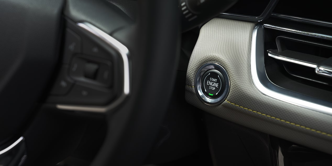 Close-up view of the keyless start button inside the 2026 Chevrolet Trailblazer.