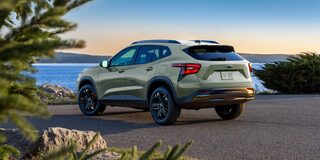 Back-side view of a 2026 Chevrolet Trax Parked Facing a Lake.