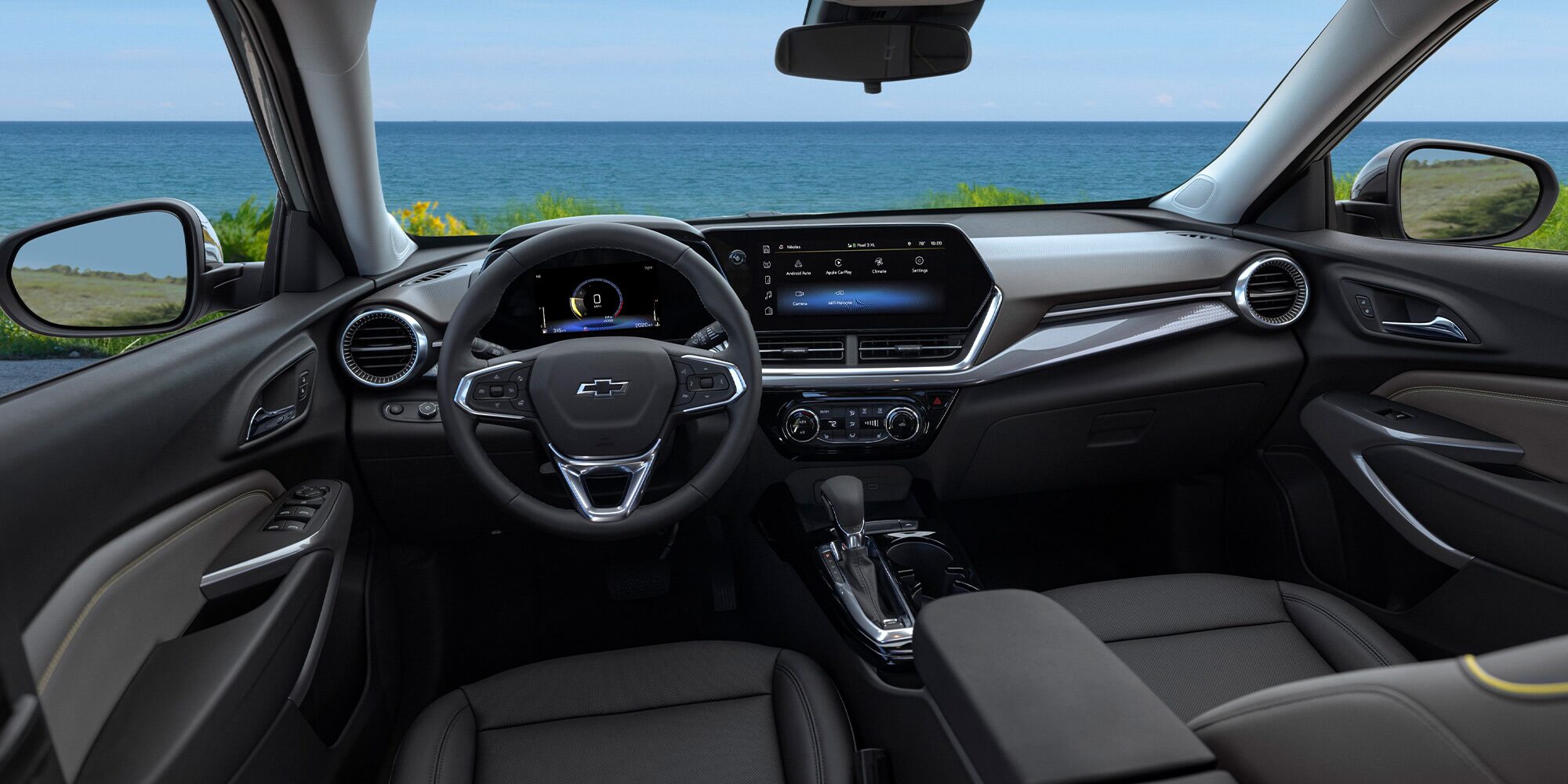 Driver's view of the spacious front interiors of the 2026 Chevrolet Trax.