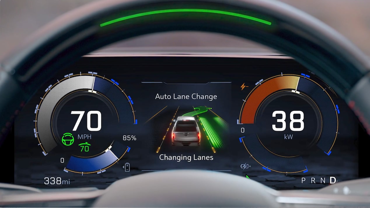 Driver's view of the steering wheel and dashboard on the 2025 Chevrolet Silverado EV.