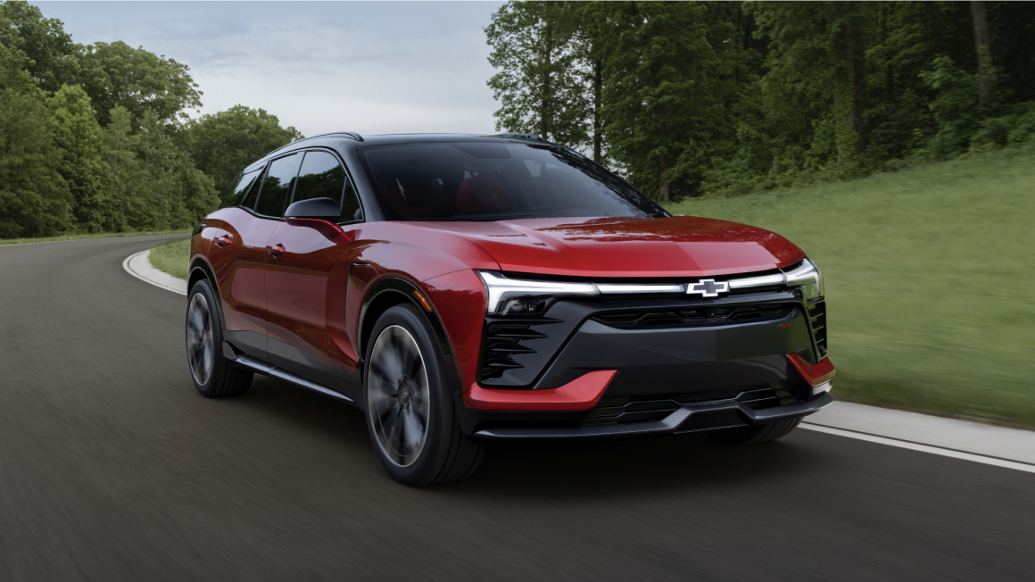 2026 Chevrolet Blazer EV driving alone on the road.