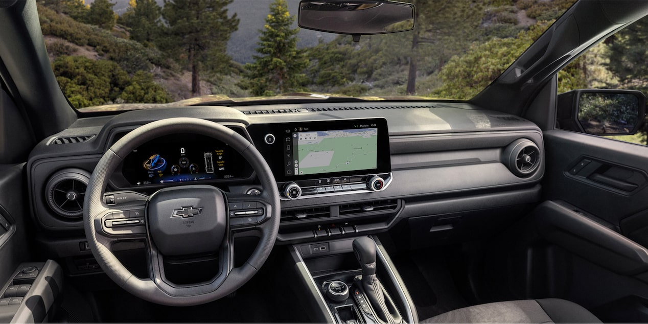 Close-up of the Steering Wheel and Dashboard Monitor of a 2025 Chevrolet Colorado.