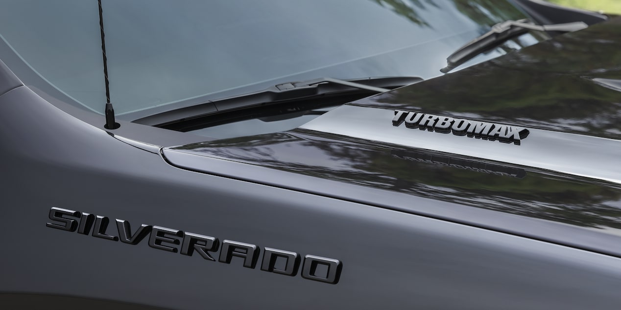 Close up view of the Silverado badging etched on the front exteriors of the 2026 Chevrolet Silverado LD.
