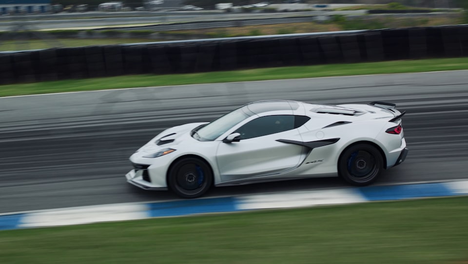 2026 Chevrolet Corvette ZR1X driving fast on the road.