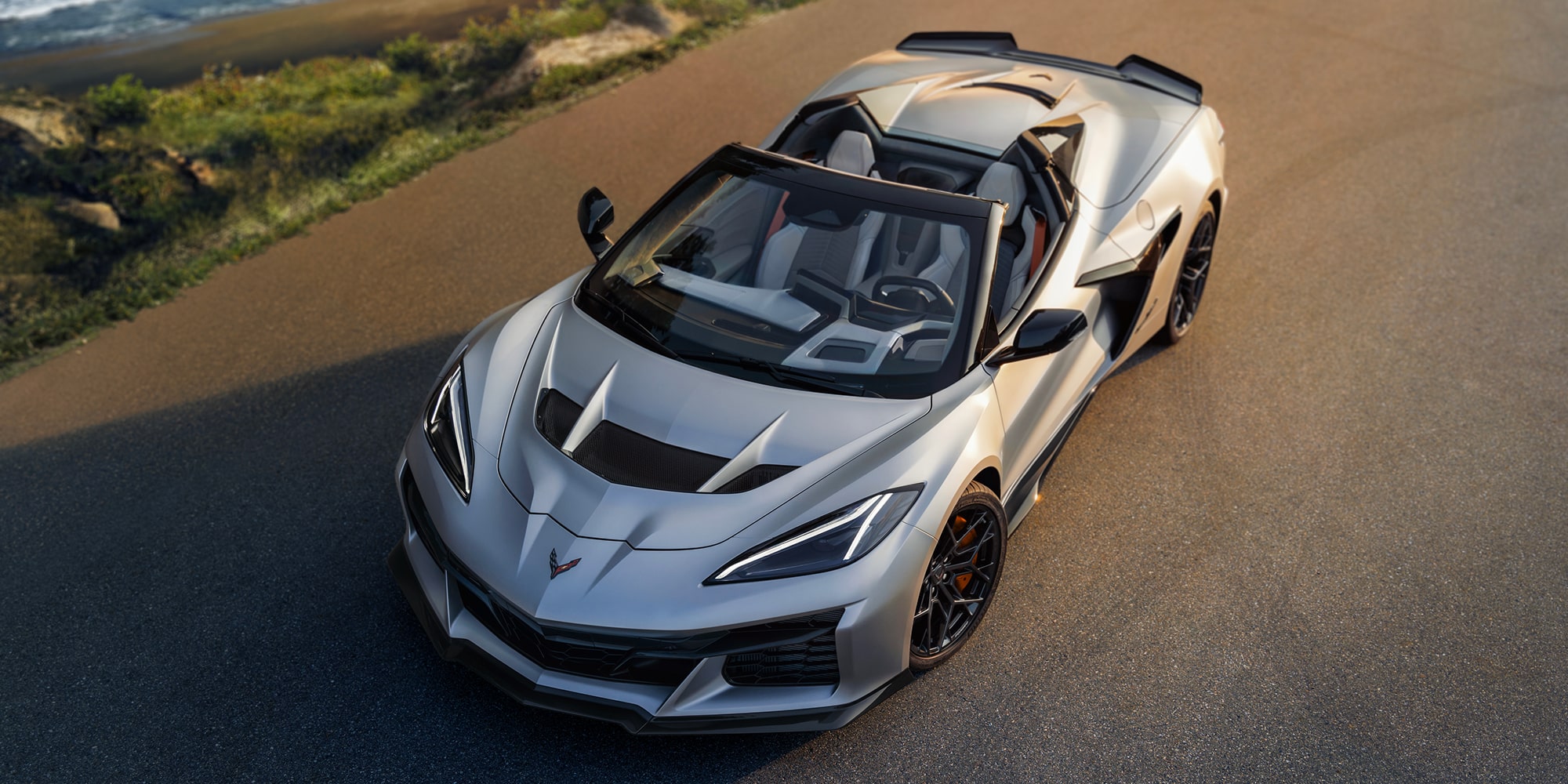 Front-side view of the 2026 Chevrolet Corvette ZR1X parked alone outdoors.