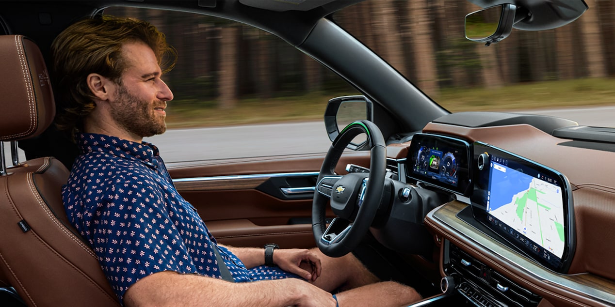 Front passenger's view of the Super Cruise Feature being used by a driver in the 2025 Chevrolet Suburban SUV.