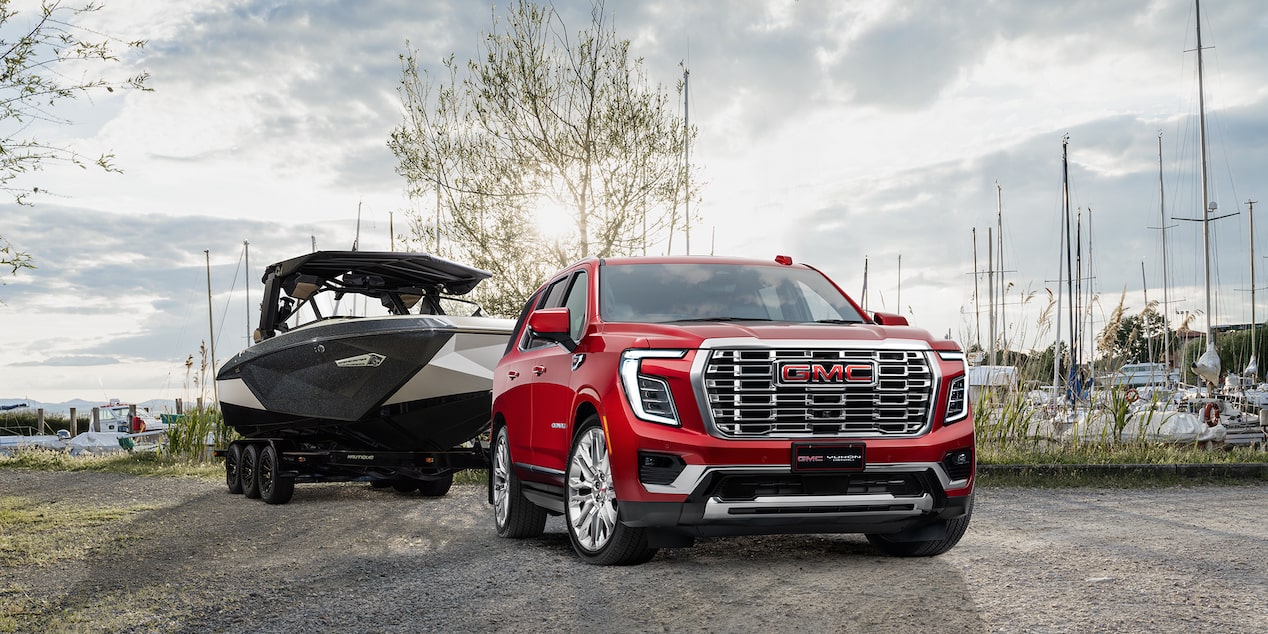 Volcanic red Yukon towing boat