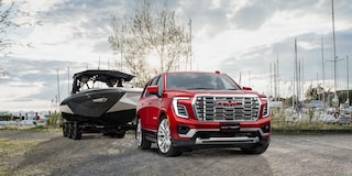 Volcanic red Yukon towing boat