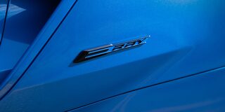 Close-Up of the E-Ray Emblem on Side of the Exterior 2024 Chevrolet Corvette E-Ray