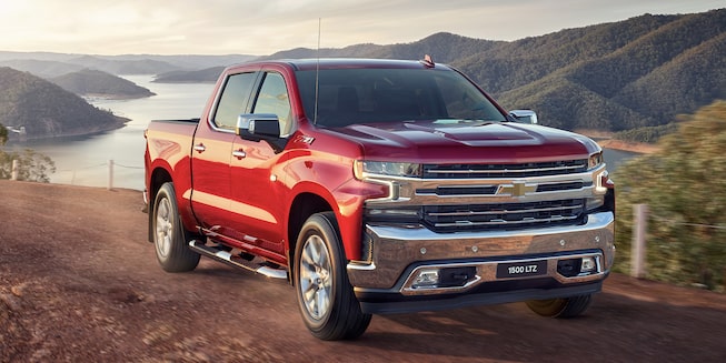 2021 Silverado 1500 Pickup Truck Front Passenger View on Road