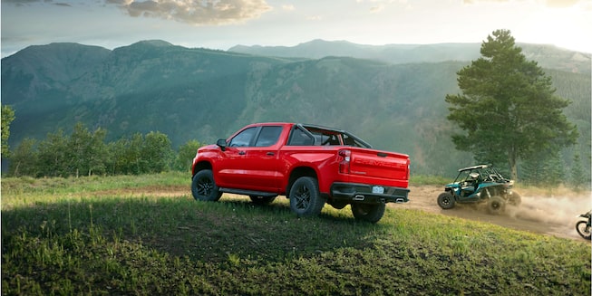 Chevrolet Silverado 1500 Crew Cab LT Trail Boss shown in Red Hot Exterior Beauty.