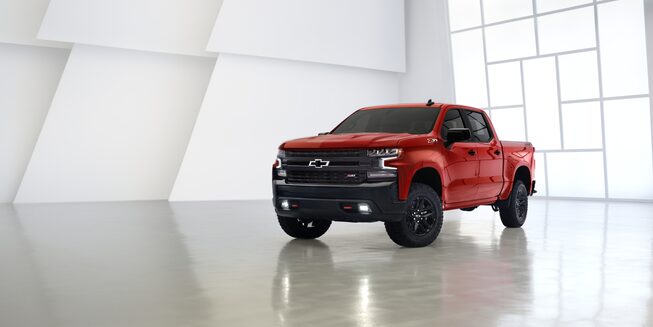 Chevrolet Silverado Trail-Boss in Red Hot.--- 3/4 driver side front.